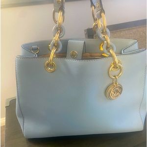 Michael Kors baby blue purse lightly used